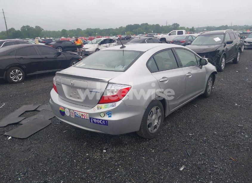 Photo 4 of 2012 Honda Civic HYBRID (VIN JHMFB4F3XCS007123)