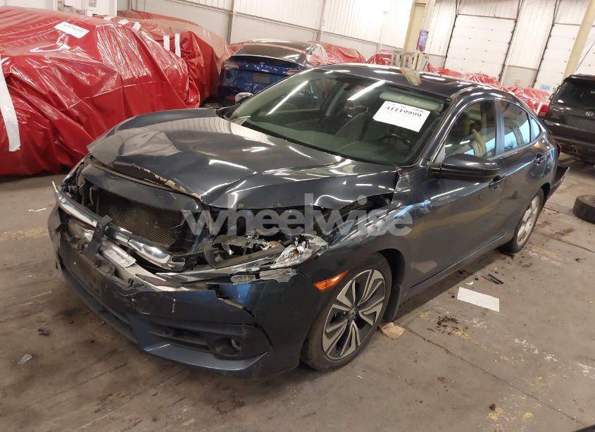 Photo 2 of 2018 Honda Civic EX-T (VIN JHMFC1F30JX030860)