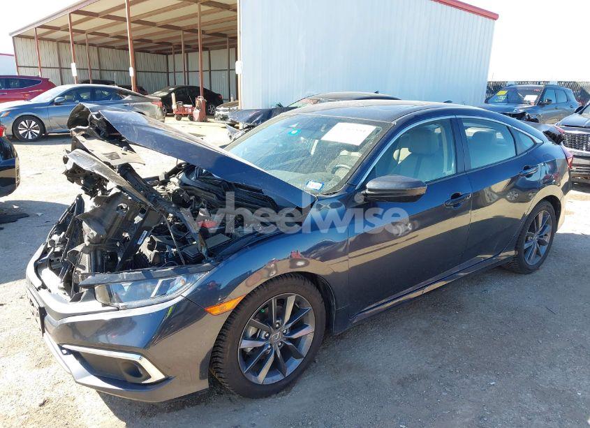 Photo 2 of 2019 Honda Civic EX (VIN JHMFC1F31KX005256)
