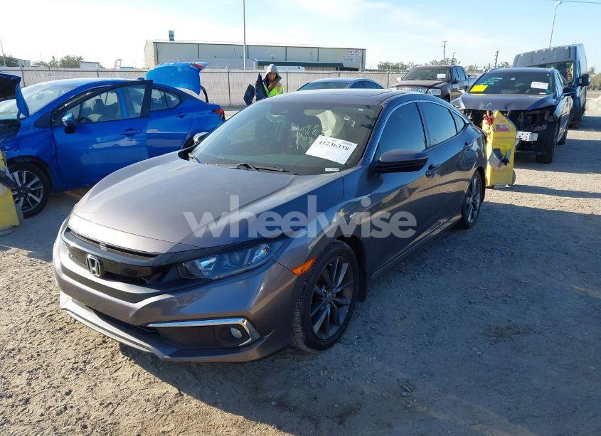 Photo 2 of 2019 Honda Civic EX (VIN JHMFC1F31KX005497)