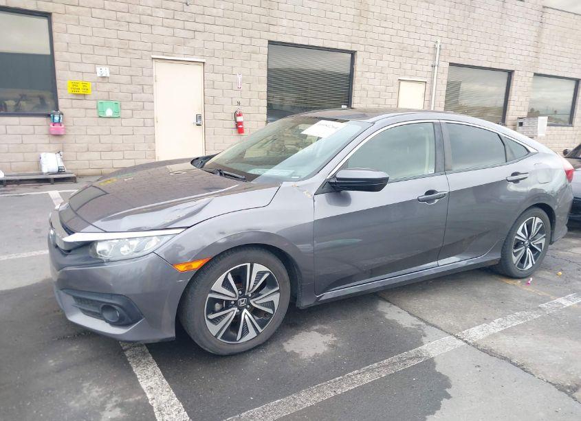 Photo 2 of 2018 Honda Civic EX-T (VIN JHMFC1F32JX005989)