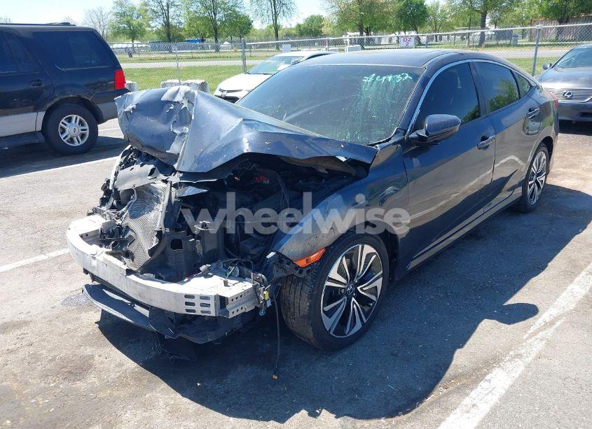 Photo 2 of 2018 Honda Civic EX-T (VIN JHMFC1F32JX024932)