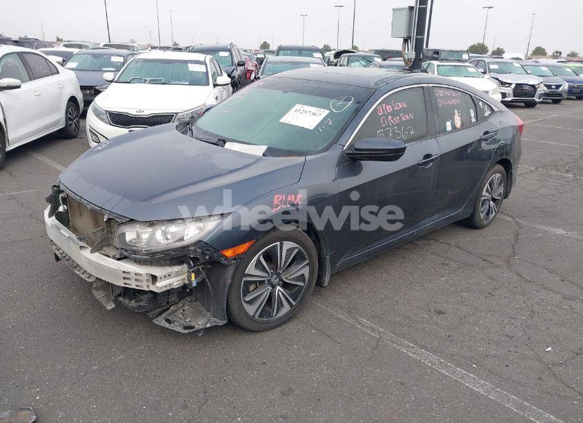 Photo 2 of 2018 Honda Civic EX-T (VIN JHMFC1F32JX037311)