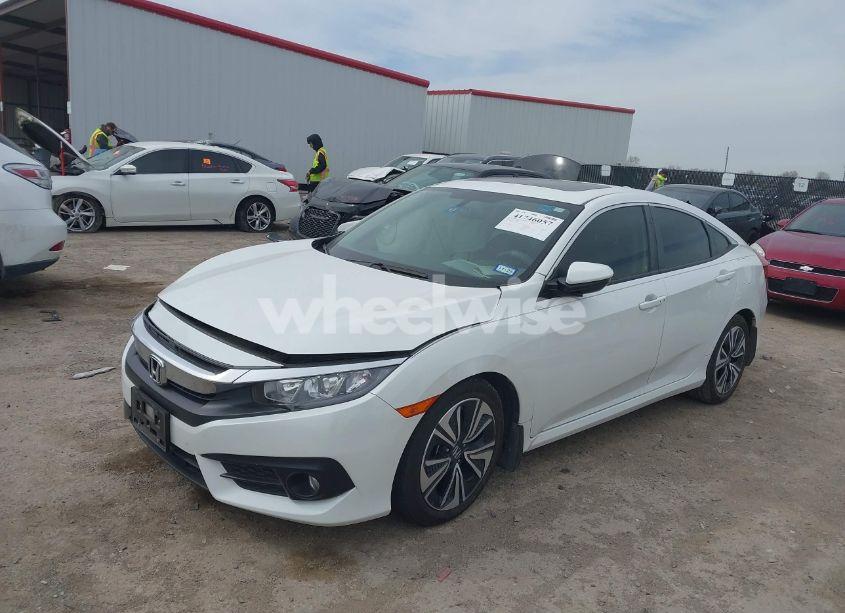 Photo 2 of 2018 Honda Civic EX-T (VIN JHMFC1F33JX037978)