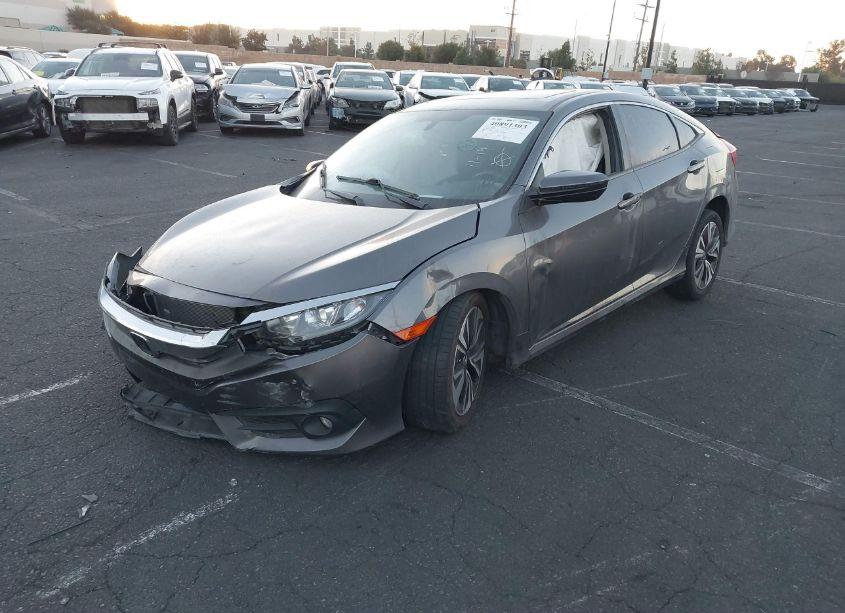 Photo 2 of 2018 Honda Civic EX-T (VIN JHMFC1F34JX039111)