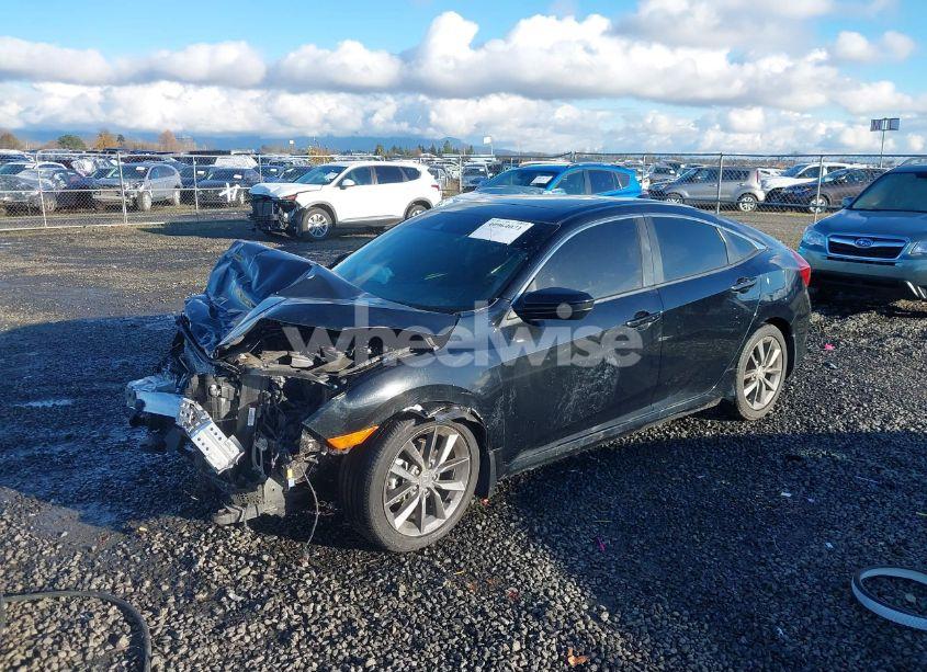 Photo 2 of 2019 Honda Civic EX (VIN JHMFC1F34KX014582)