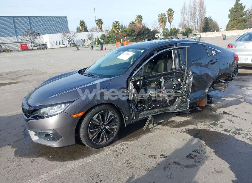 Photo 2 of 2018 Honda Civic EX-T (VIN JHMFC1F37JX017636)