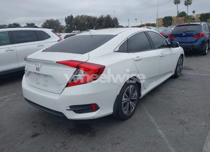 Photo 4 of 2018 Honda Civic EX-T (VIN JHMFC1F37JX033660)