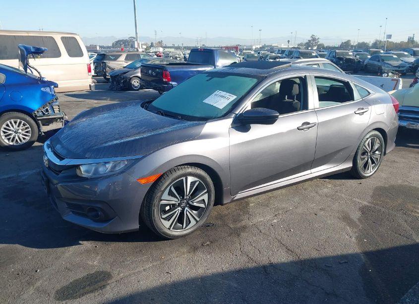 Photo 2 of 2018 Honda Civic EX-T (VIN JHMFC1F38JX042397)