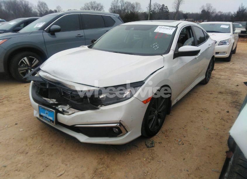 Photo 2 of 2019 Honda Civic EX (VIN JHMFC1F38KX000278)