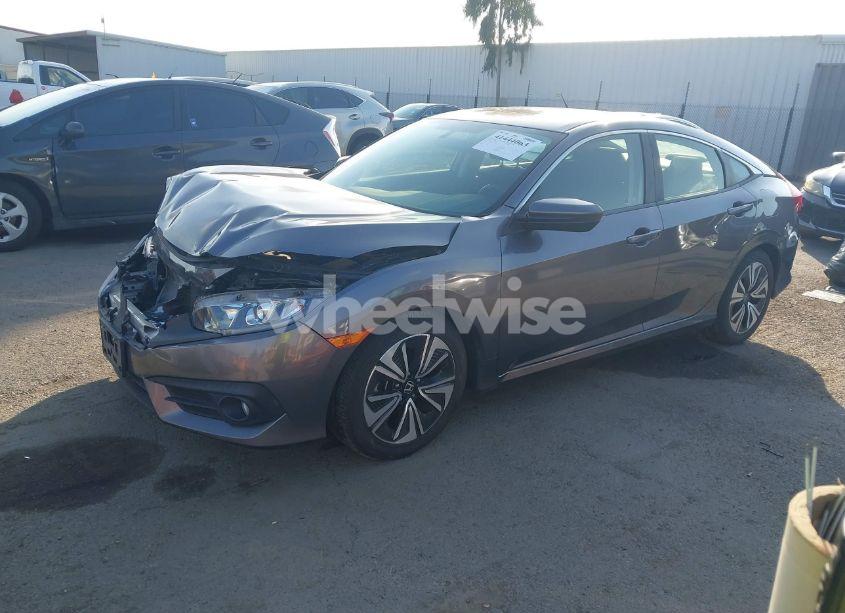 Photo 2 of 2018 Honda Civic EX-T (VIN JHMFC1F39JX005990)