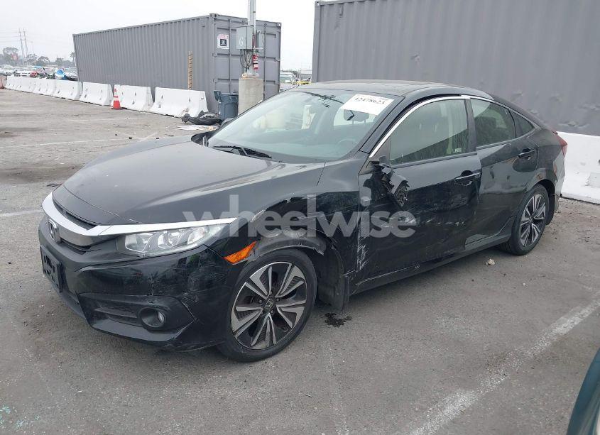 Photo 2 of 2018 Honda Civic EX-T (VIN JHMFC1F39JX033210)