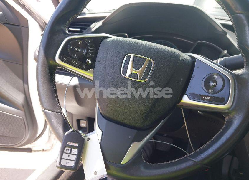Photo 11 of 2018 Honda Civic EX-T (VIN JHMFC1F3XJX001723)