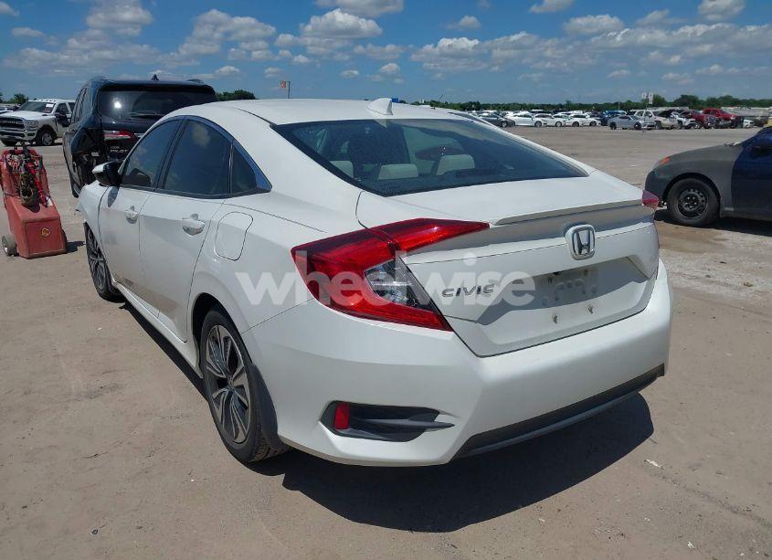 Photo 3 of 2018 Honda Civic EX-T (VIN JHMFC1F3XJX001723)