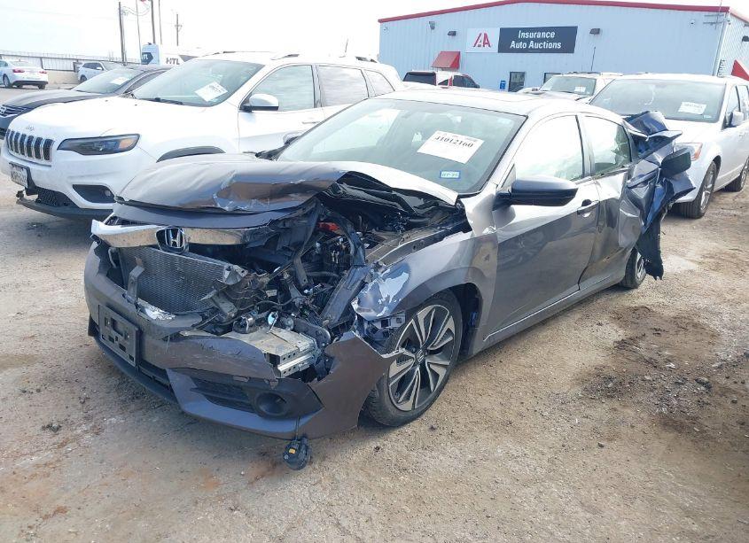 Photo 2 of 2018 Honda Civic EX-T (VIN JHMFC1F3XJX009577)