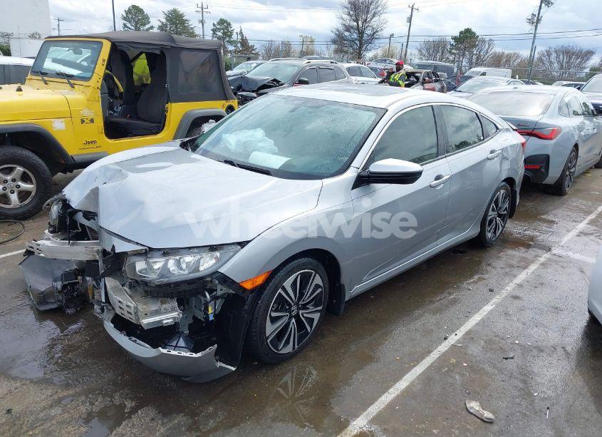 Photo 2 of 2018 Honda Civic EX-L (VIN JHMFC1F71JX038694)