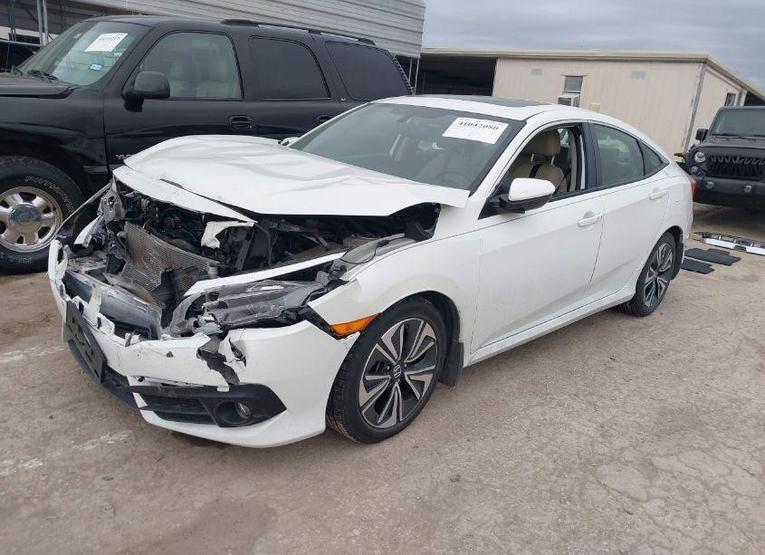 Photo 2 of 2018 Honda Civic EX-L (VIN JHMFC1F75JX001065)