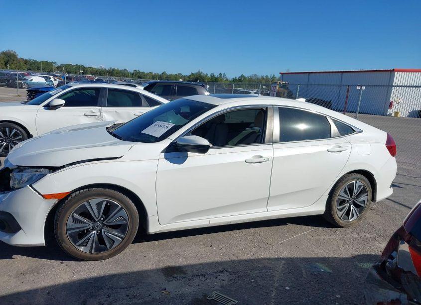 Photo 14 of 2018 Honda Civic EX-L (VIN JHMFC1F76JX021034)