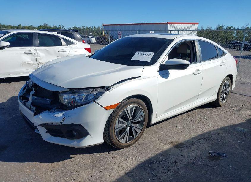 Photo 2 of 2018 Honda Civic EX-L (VIN JHMFC1F76JX021034)