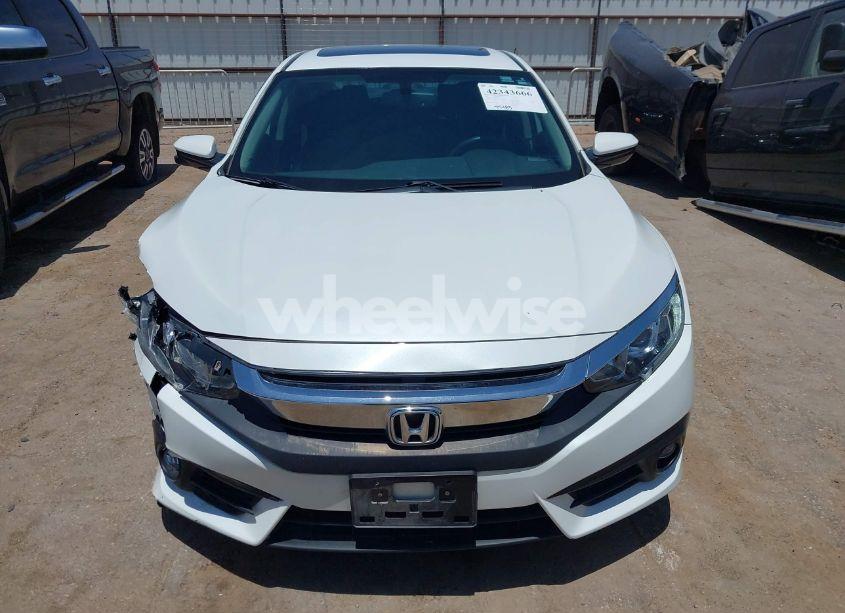 Photo 12 of 2018 Honda Civic EX-L (VIN JHMFC1F77JX011144)