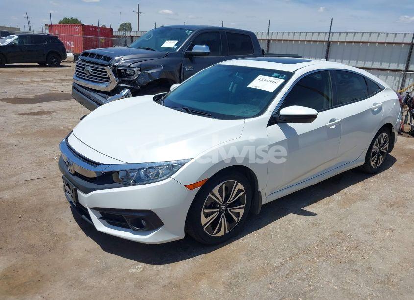 Photo 2 of 2018 Honda Civic EX-L (VIN JHMFC1F77JX011144)