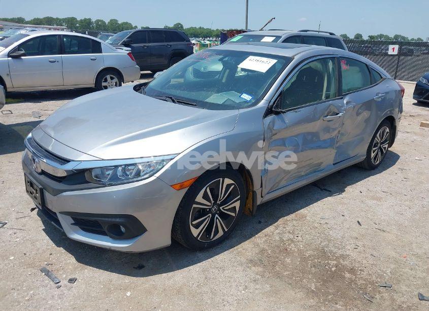 Photo 2 of 2018 Honda Civic EX-L (VIN JHMFC1F77JX017199)