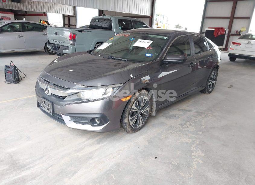 Photo 2 of 2018 Honda Civic EX-L (VIN JHMFC1F78JX015607)