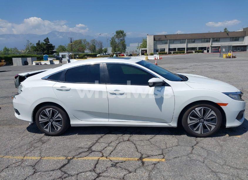 Photo 14 of 2018 Honda Civic EX-L (VIN JHMFC1F78JX036294)