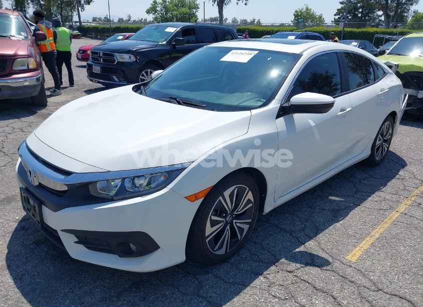 Photo 2 of 2018 Honda Civic EX-L (VIN JHMFC1F78JX036294)