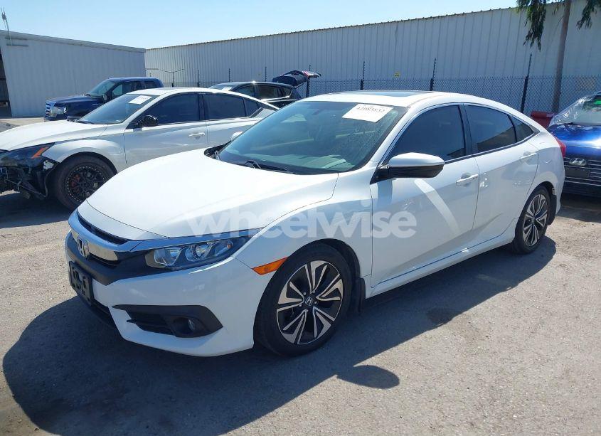 Photo 2 of 2018 Honda Civic EX-L (VIN JHMFC1F79JX039141)