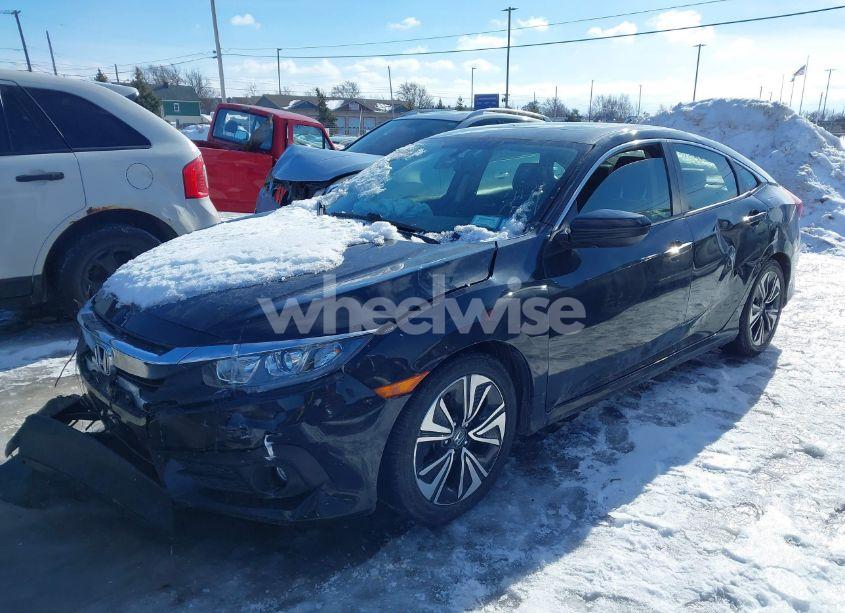 Photo 2 of 2018 Honda Civic EX-L (VIN JHMFC1F7XJX039228)