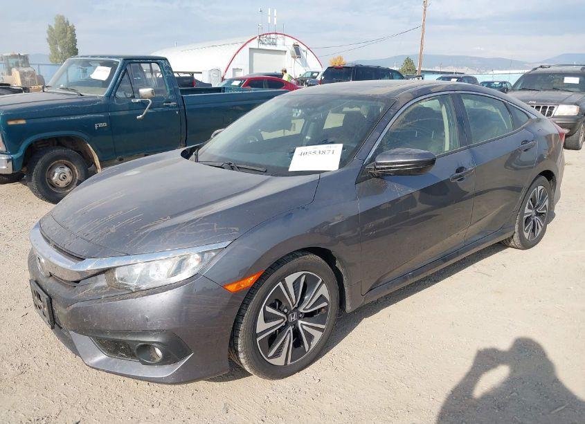 Photo 2 of 2018 Honda Civic EX-L (VIN JHMFC1F81JX034038)