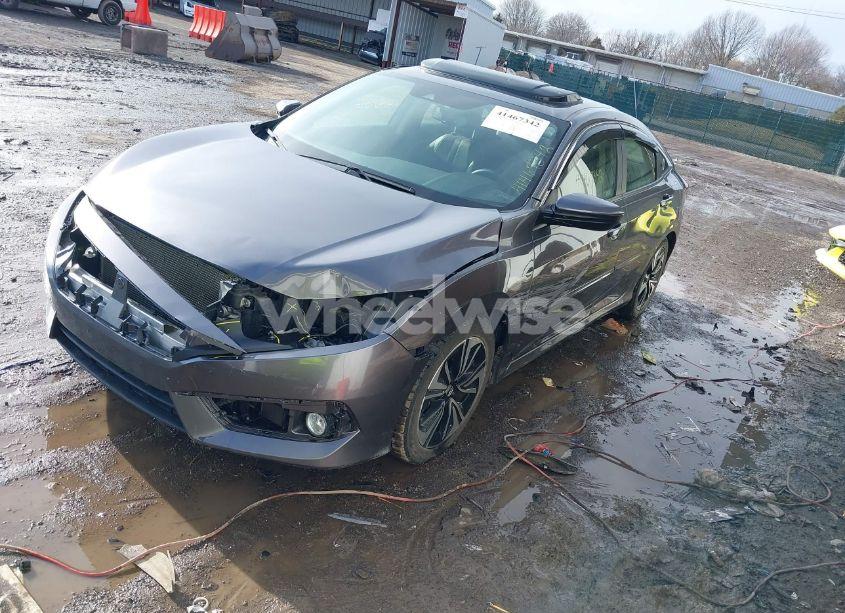 Photo 2 of 2018 Honda Civic EX-L (VIN JHMFC1F85JX014701)