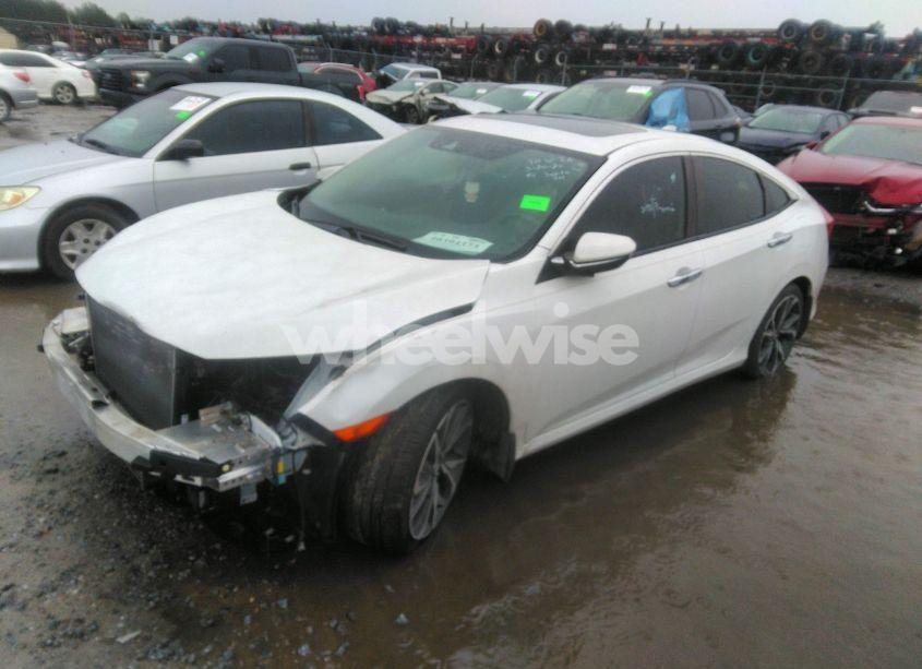 Photo 2 of 2019 Honda Civic TOURING (VIN JHMFC1F90KX002322)