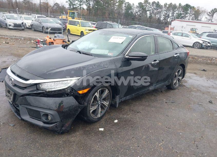Photo 2 of 2018 Honda Civic TOURING (VIN JHMFC1F91JX012002)