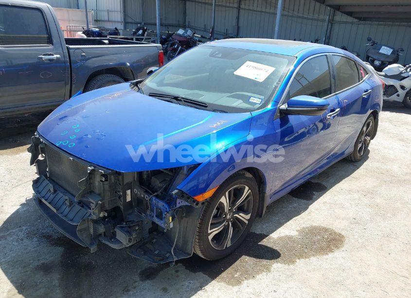 Photo 2 of 2018 Honda Civic TOURING (VIN JHMFC1F94JX011992)