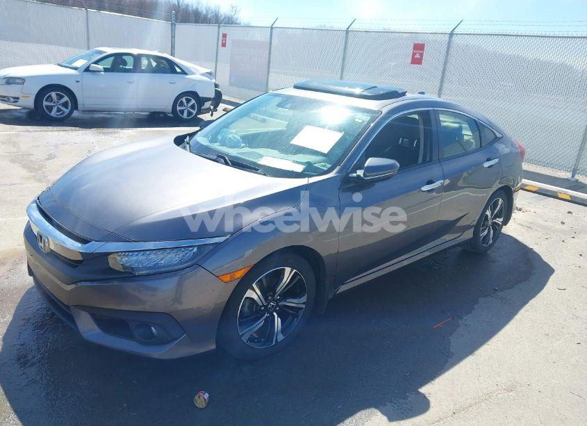 Photo 2 of 2018 Honda Civic TOURING (VIN JHMFC1F95JX006736)