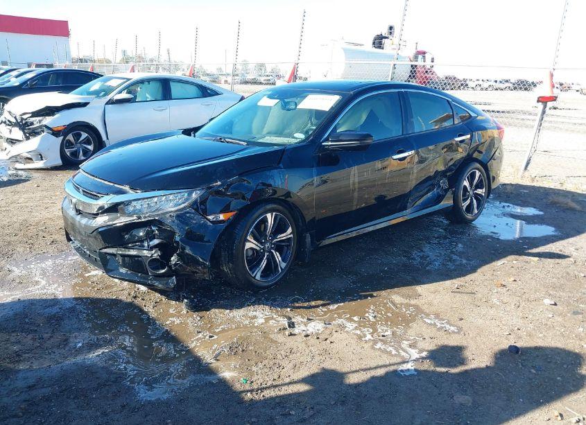 Photo 2 of 2018 Honda Civic TOURING (VIN JHMFC1F98JX026110)