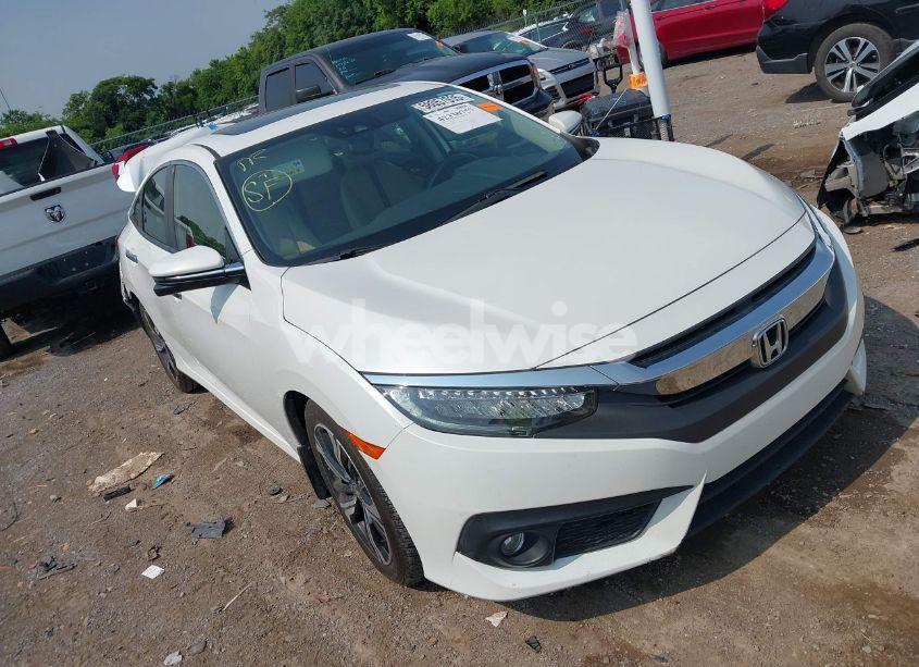 2018 Honda Civic TOURING (VIN JHMFC1F99JX035723) main photo
