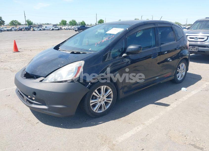 Photo 2 of 2009 Honda Fit SPORT (VIN JHMGE88459S002574)