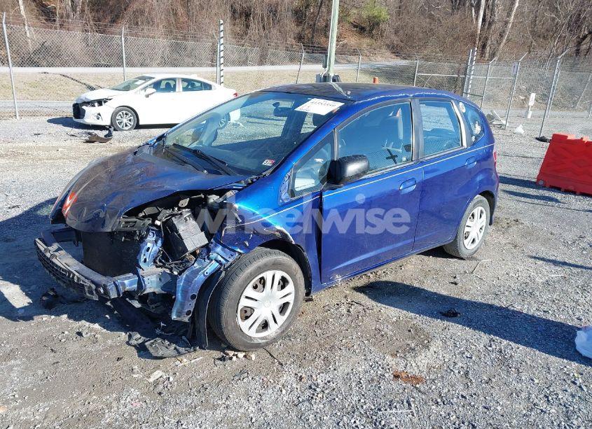 Photo 2 of 2010 Honda Fit (VIN JHMGE8G23AS000696)