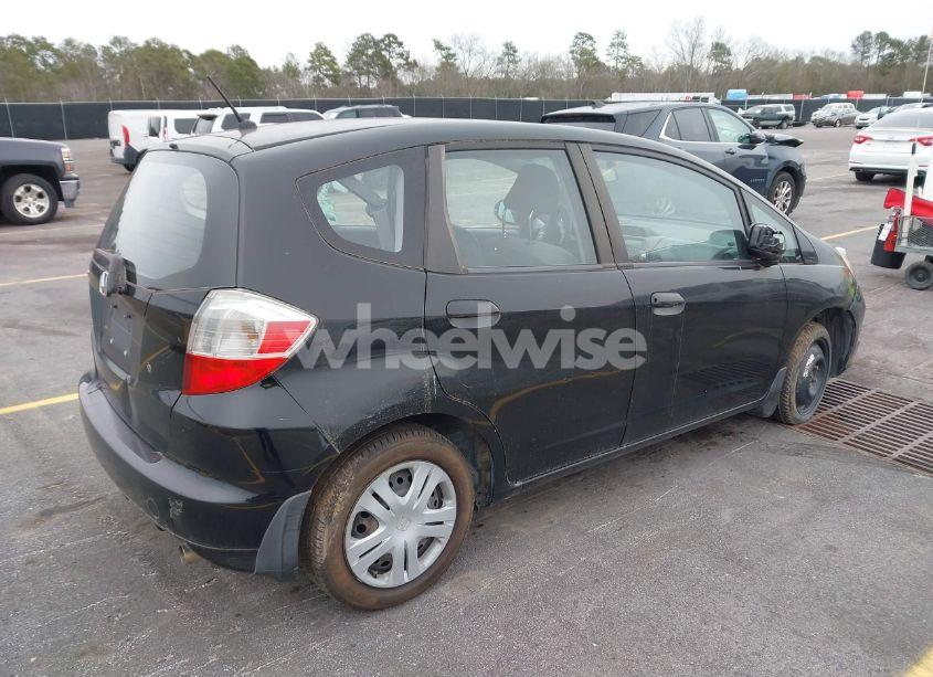 Photo 4 of 2010 Honda Fit (VIN JHMGE8G29AS013999)