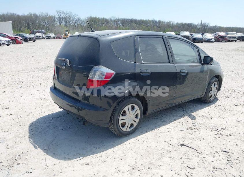 Photo 4 of 2011 Honda Fit (VIN JHMGE8G3XBS000995)