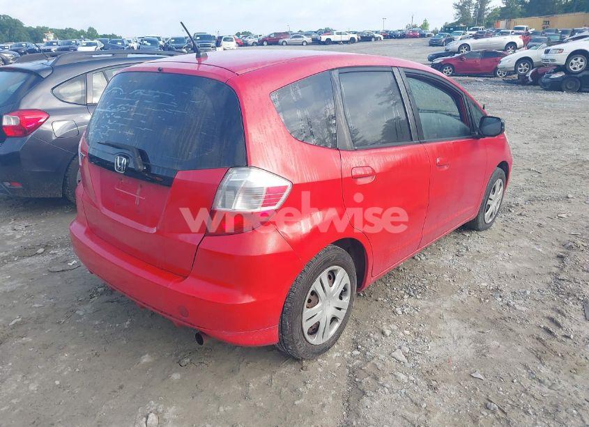 Photo 4 of 2011 Honda Fit (VIN JHMGE8H30BC011383)