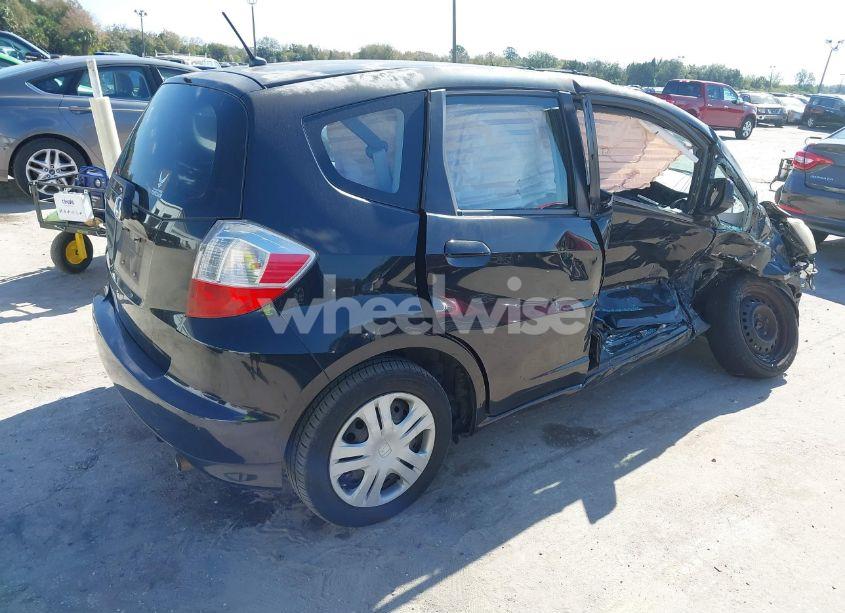 Photo 4 of 2011 Honda Fit (VIN JHMGE8H32BC015001)