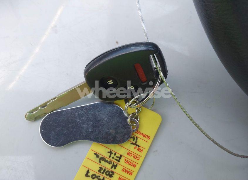 Photo 11 of 2012 Honda Fit (VIN JHMGE8H32CS001963)