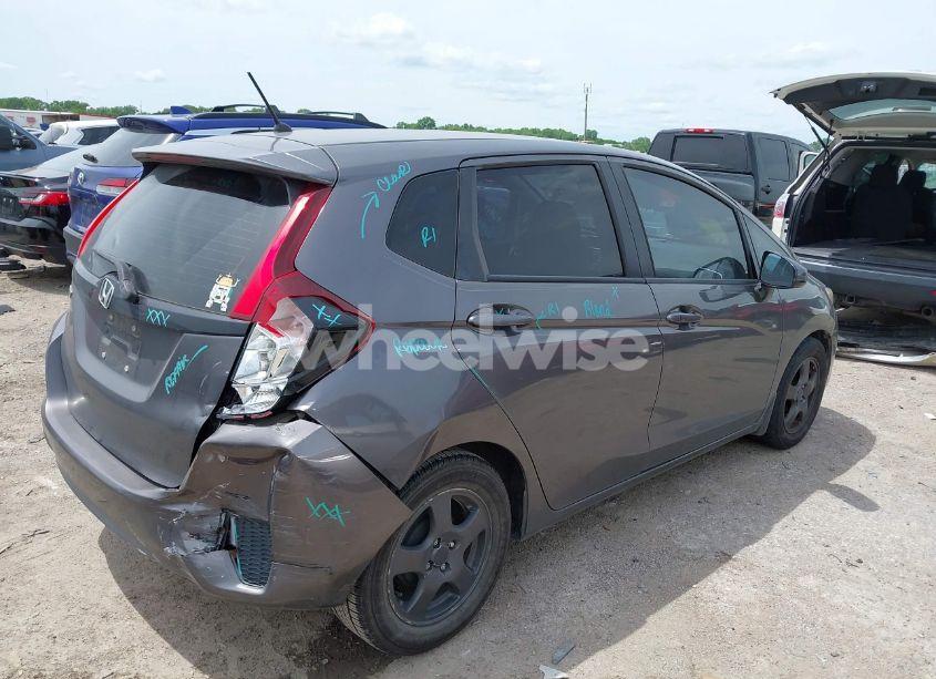 Photo 4 of 2016 Honda Fit LX (VIN JHMGK5H59GX033309)