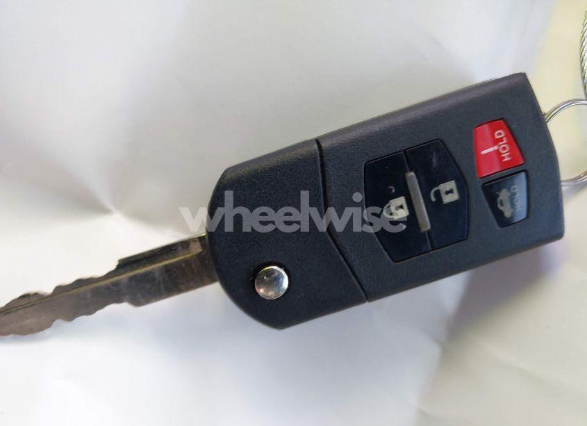 Photo 11 of 2012 Mazda Mazda3 I TOURING (VIN JM1BL1L89C1558242)