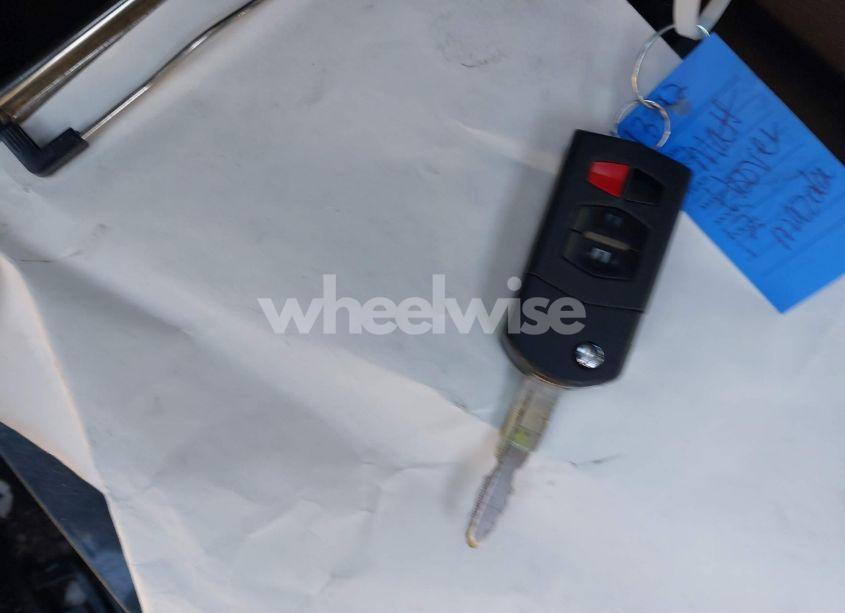 Photo 11 of 2012 Mazda Mazda3 I TOURING (VIN JM1BL1VF1C1514215)