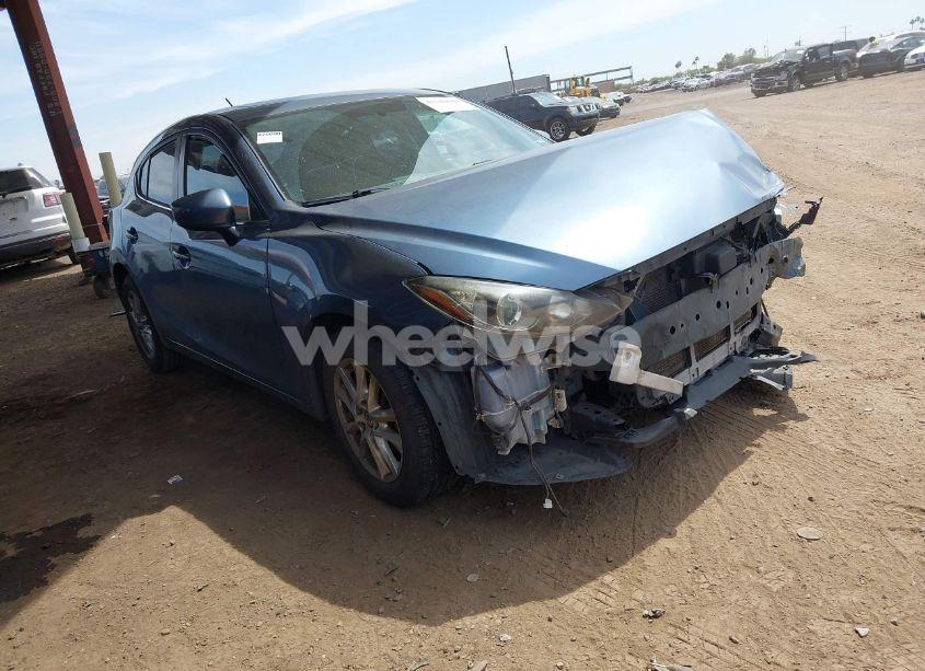 2014 Mazda Mazda3 I TOURING (VIN JM1BM1L71E1151538) main photo